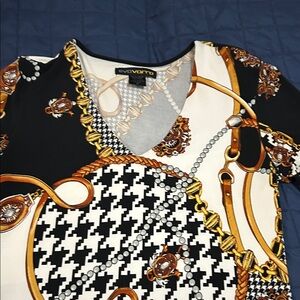 Eva Varro Black and White Top with Gold Accents